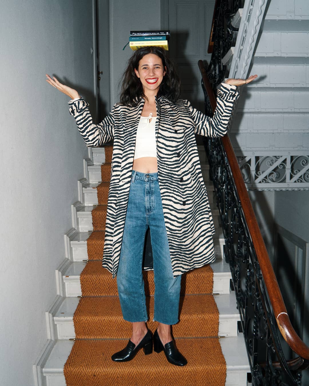 Thank you to all the beautiful books I read when I was younger. They taught me to be shameless and nobody else but me, to do what I want, to say what I want and to wear what I want, always, no matter the looks others give me. Today is Zebra-Day - as an hommage to the fabulous Dolly Alderton who nailed this Wednesday’s mood forever: „I am always half in life, half in a fantastical version of it in my head.“ / Advertising @zalando #zalandostyle  #freetobe *coat: byMaleneBirger, shoes: Miista, jeans: Levi's